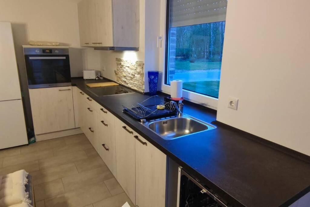 Appartamento Neubau, Moderne Haushaelfte In *